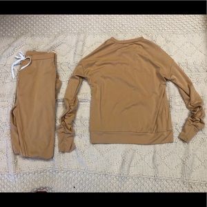 A women’s mustard yellow comfortable outfit.